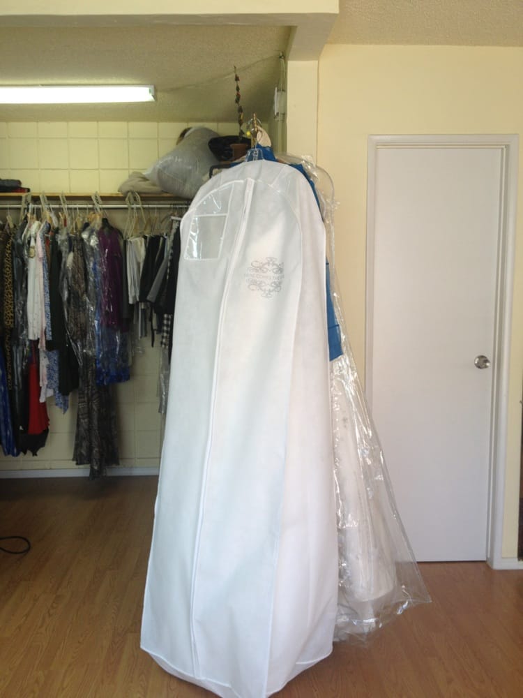 Couple on San Diego bay — altered wedding attire