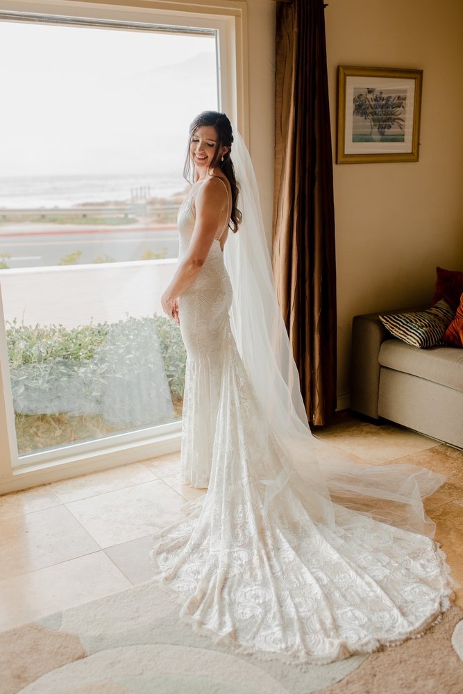 Beautiful bride in altered wedding dress by Kiki's Alterations